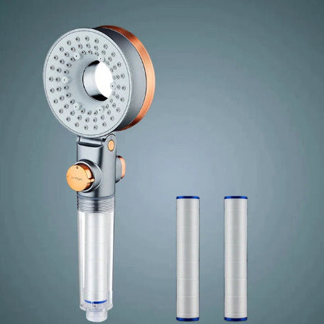 Shower head with two filters on a grey background